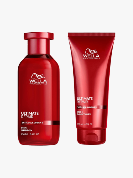 Wella Professionals Ultimate Repair Shampoo and Conditioner in branded components on a light gray background