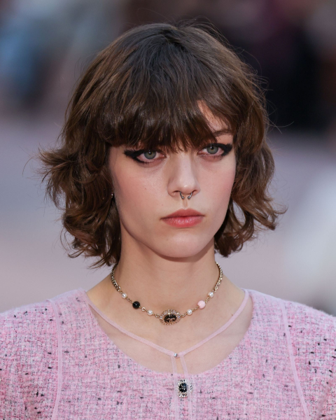 Model wearing pink tweed