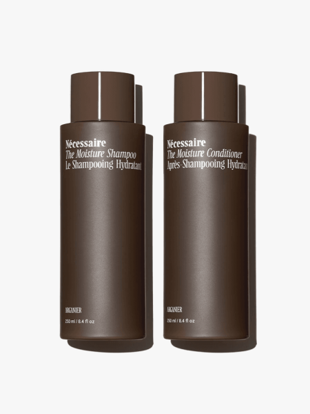 Nécessaire The Hair Moisture Duo in branded components on a light gray background