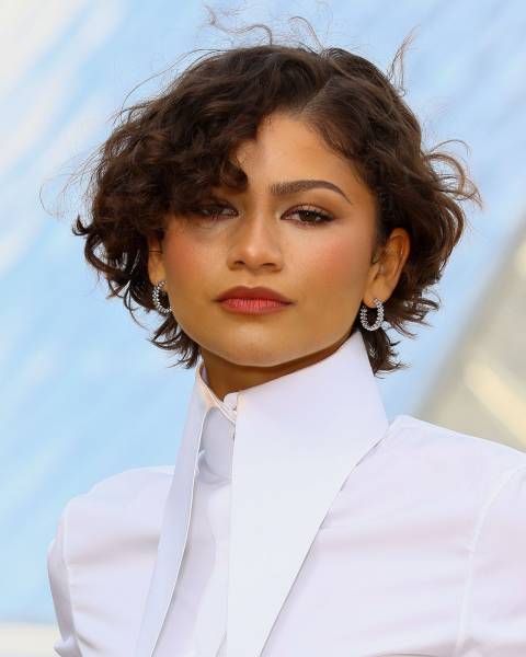 Zendaya wearing a white collared shirt